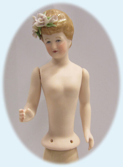 Frieda with flowers in her hair, Porcelain Half Doll.